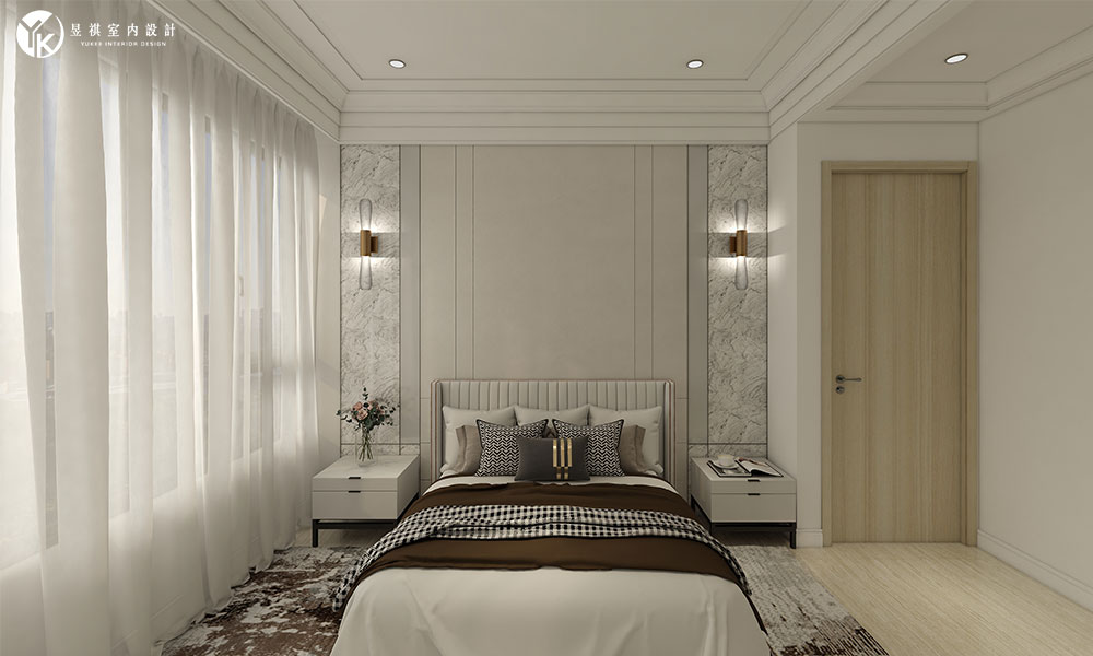 臥室以柔和色調與木質元素搭配，營造溫暖舒適的休息空間。